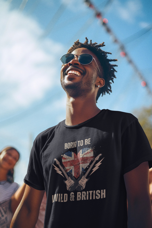 Man wearing sunglasses and a black t-shirt with a British flag design, standing outdoors.